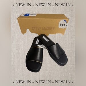 NWT Steve Madden Kaya slide sandals in black leather, size 7.
